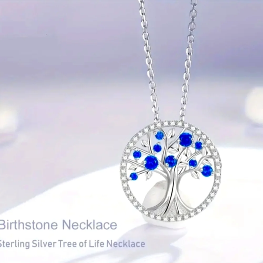 925 SS Moisannite and Blue Sapphire Tree of Life Necklace.